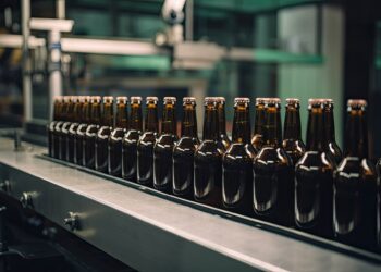 bottles of beer oin an industrial production line