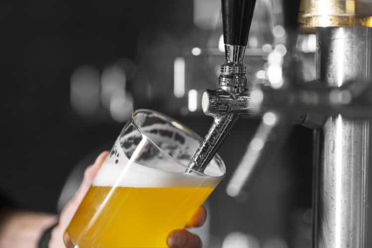 Draught bear pouring into a glass